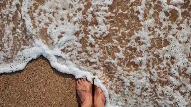 Feet in the surf